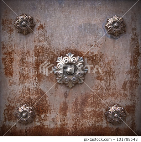 Old rusty metal surface with monograms 101789548