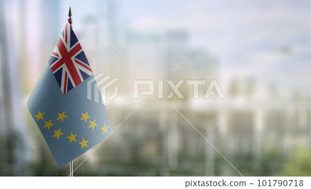 Small flags of the Tuvalu on an abstract blurry background Small flags of the Tuvalu on an abstract blurry background 101790718