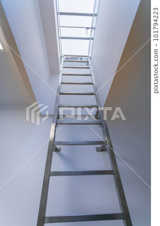 Stainless steel ladder installed at the entrance to the roof. 101794223