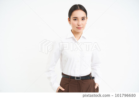 Influencers and business. Confident young businesswoman with professional attitude, stands over white background 101796680