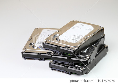 pile or stack of HDD, SSHD Hybrid hard disk drives 3.5" standard profile show on SATA interface, isolated on white background 101797070