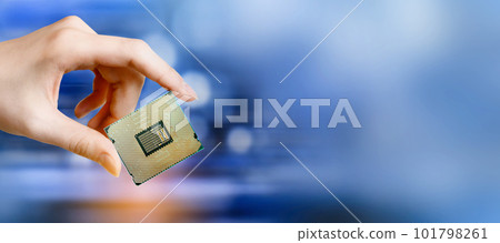 Microchip of a new generation processor in a woman's hand 101798261