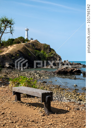 Bench with the view of lighthouse on Koh Lanta. Mu Ko Lanta National Park, Krabi , Thailand. Bench with the view of lighthouse on Koh Lanta. Mu Ko Lanta National Park, Krabi , Thailand. 101798342