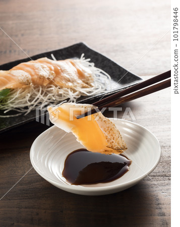 Grilled salmon sashimi 101798446