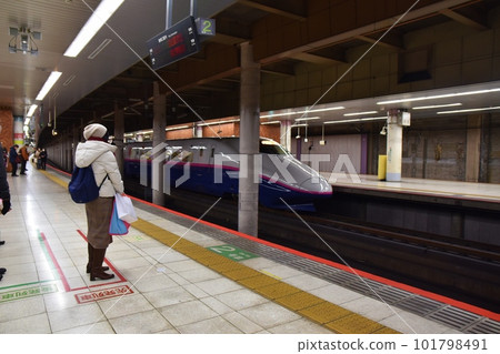 People waiting for the Shinkansen at Ueno Station Tokyo 101798491