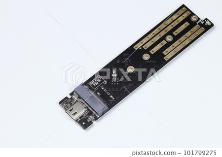 The M.2 to usb type-C adapter for convert interface from NVME PCIe M2 to USB interface isolated on white background The M.2 to usb type-C adapter for convert interface from NVME PCIe M2 to USB interface isolated on white background 101799275