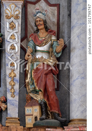 Statue of Saint Florian on the main altar in the Church of Assumption of the Virgin Mary in Pokupsko, Croatia Statue of Saint Florian on the main altar in the Church of Assumption of the Virgin Mary in Pokupsko, Croatia 101799747