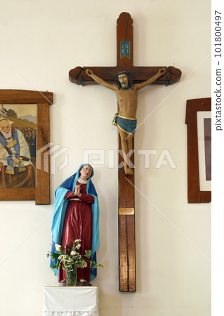 Virgin Mary under the cross, statue in the parish church of St. Michael the Archangel in Mihovljan, Croatia 101800497