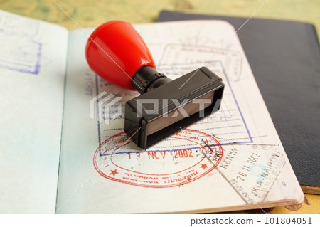 Visa and passport document to immigration at airport in country. 101804051
