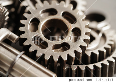 Metal gear wheel engine car and bike, mechanic industry concept. Metal gear wheel engine car and bike, mechanic industry concept. 101804141