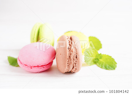 Macaron or french macaroon dessert, cake and cookies on the celebrated birthday. Macaron or french macaroon dessert, cake and cookies on the celebrated birthday. 101804142