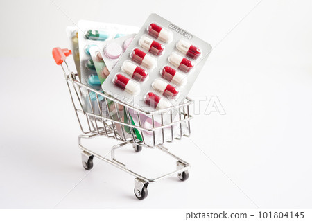 Shopping trolley with blister pill and capsule from drug prescription, pharmacy for treatment health medicine. Shopping trolley with blister pill and capsule from drug prescription, pharmacy for treatment health medicine. 101804145