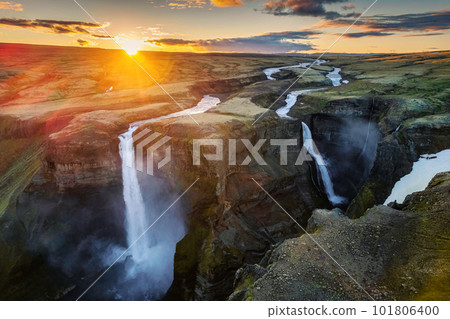 Majestic of Haifoss waterfall flowing on volcanic canyon among Icelandic Highlands in summer at Iceland Majestic of Haifoss waterfall flowing on volcanic canyon among Icelandic Highlands in summer at Iceland 101806400