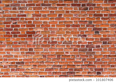 Natural old vintage weathered red brown solid brick wall. Abstract copy space background. Natural old vintage weathered red brown solid brick wall. Abstract copy space background. 101807406