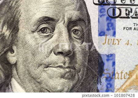 Money, busyness and finances concept. One hundred dollar bill detail with president Franklin portrait close-up. American national currency banknote. Symbol of wealth and prosperity. 101807428