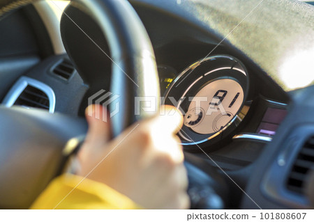 Modern car interior with driver hand on steering wheel. Safe driving concept. Modern car interior with driver hand on steering wheel. Safe driving concept. 101808607