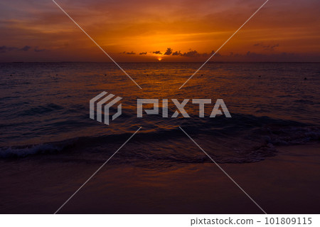 Sea beach with sky sunset or sunrise. Clouds over the sunset sea. Sea beach with sky sunset or sunrise. Clouds over the sunset sea. 101809115