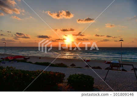 Sea beach with sky sunset or sunrise. Clouds over the sunset sea. Sea beach with sky sunset or sunrise. Clouds over the sunset sea. 101809146