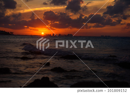 Sea beach with sky sunset or sunrise. Clouds over the sunset sea. Sea beach with sky sunset or sunrise. Clouds over the sunset sea. 101809152
