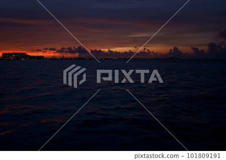Sea beach with sky sunset or sunrise. Clouds over the sunset sea. Sea beach with sky sunset or sunrise. Clouds over the sunset sea. 101809191