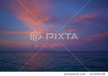 Sea beach with sky sunset or sunrise. Clouds over the sunset sea. Sea beach with sky sunset or sunrise. Clouds over the sunset sea. 101809196