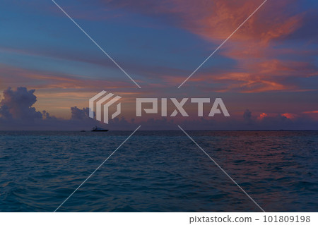 Sea beach with sky sunset or sunrise. Clouds over the sunset sea. Sea beach with sky sunset or sunrise. Clouds over the sunset sea. 101809198