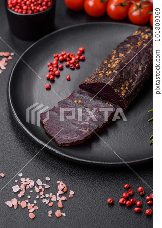 Delicious smoked Armenian basturma with spices and herbs Delicious smoked Armenian basturma with spices and herbs 101809369