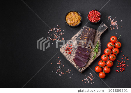 Delicious smoked Armenian basturma with spices and herbs Delicious smoked Armenian basturma with spices and herbs 101809391