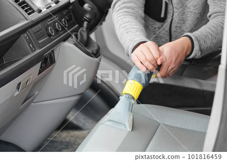 car dry cleaning. Light gray textile seats chemical cleaning with professionally extraction method. car dry cleaning. Light gray textile seats chemical cleaning with professionally extraction method. 101816459