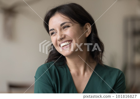 Portrait of beautiful young happy woman looking aside pose indoors Portrait of beautiful young happy woman looking aside pose indoors 101816827