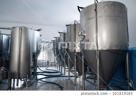 interior of modern brewery with beer fermentation tanks interior of modern brewery with beer fermentation tanks 101819165