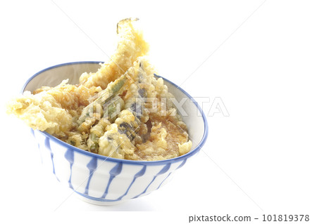 A hot tempura bowl with conger eel, eggplant, pumpkin and green bean tempura on a white background A hot tempura bowl with conger eel, eggplant, pumpkin and green bean tempura on a white background 101819378