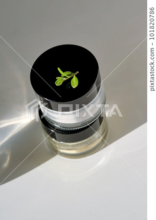 Two closed jars of enzime face scrub. 101820786