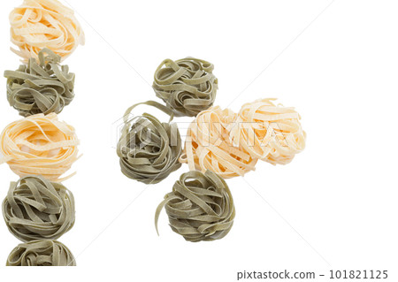 Italian fettuccine pasta in the form of a nest. Italian fettuccine pasta in the form of a nest. 101821125