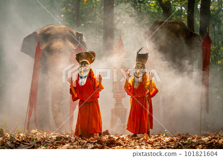 Two boy wear Pee Ta Khon, traditional culture art as ghost of Asian culture, dress 101821604