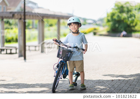 Boy riding his own train in the park Boy riding his own train in the park 101821622