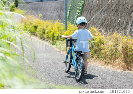 Boy riding his own train in the park 101821623