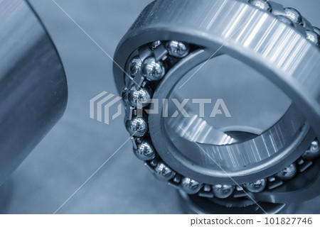 The assembly of ball bearing parts in light blue scene. The assembly of ball bearing parts in light blue scene. 101827746