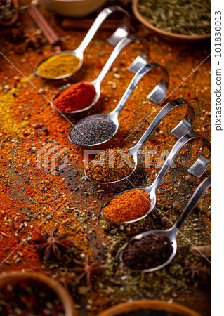 Different spices in spoons Different spices in spoons 101830013