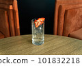 Summer cocktail garnished with strawberries. cold beverage on bar terrace. 101832218