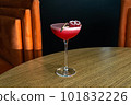 Summer cocktail garnished with raspberry berries. Pink cold beverage on bar terrace. 101832226