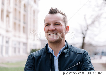 A confident business person in the city. Business vision, communications A confident business person in the city. Business vision, communications 101836026
