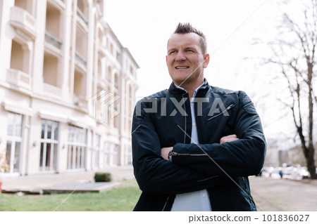 A confident business person in the city. Business vision, communications A confident business person in the city. Business vision, communications 101836027