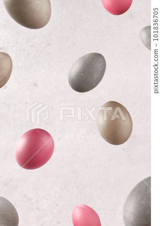 Levitating dyed eggs on a gray background. Easter celebration concept Levitating dyed eggs on a gray background. Easter celebration concept 101836705