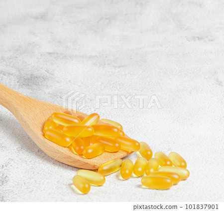 Alternative natural medicine. Omega 3 and Turmeric. Superfood, detox or diet concept. Background layout with free text space. Stock photo.	 101837901