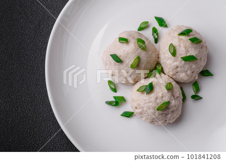 Delicious healthy steamed chicken cutlets or minced meatballs 101841208