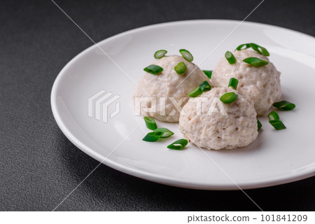 Delicious healthy steamed chicken cutlets or minced meatballs Delicious healthy steamed chicken cutlets or minced meatballs 101841209