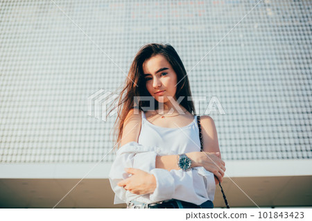 Brunette girl with long hair 101843423