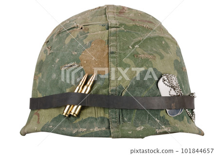 US Army battle helmet Vietnam war period with camouflage cover and dog tags 101844657