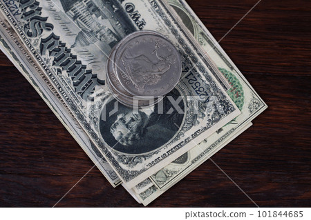 Old west period US banknotes and silver certificates with silver dollar coins Old west period US banknotes and silver certificates with silver dollar coins 101844685